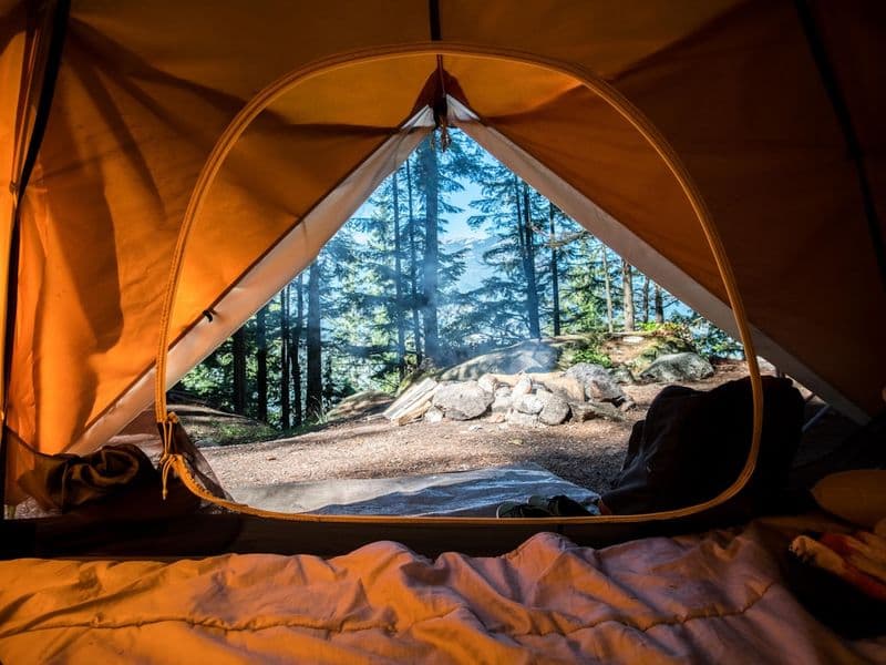 A cooler set up for an outdoor summer camping trip