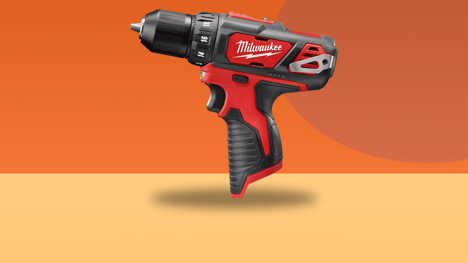 Milwaukee M12 2407-20 compact cordless drill/driver on a colorful background