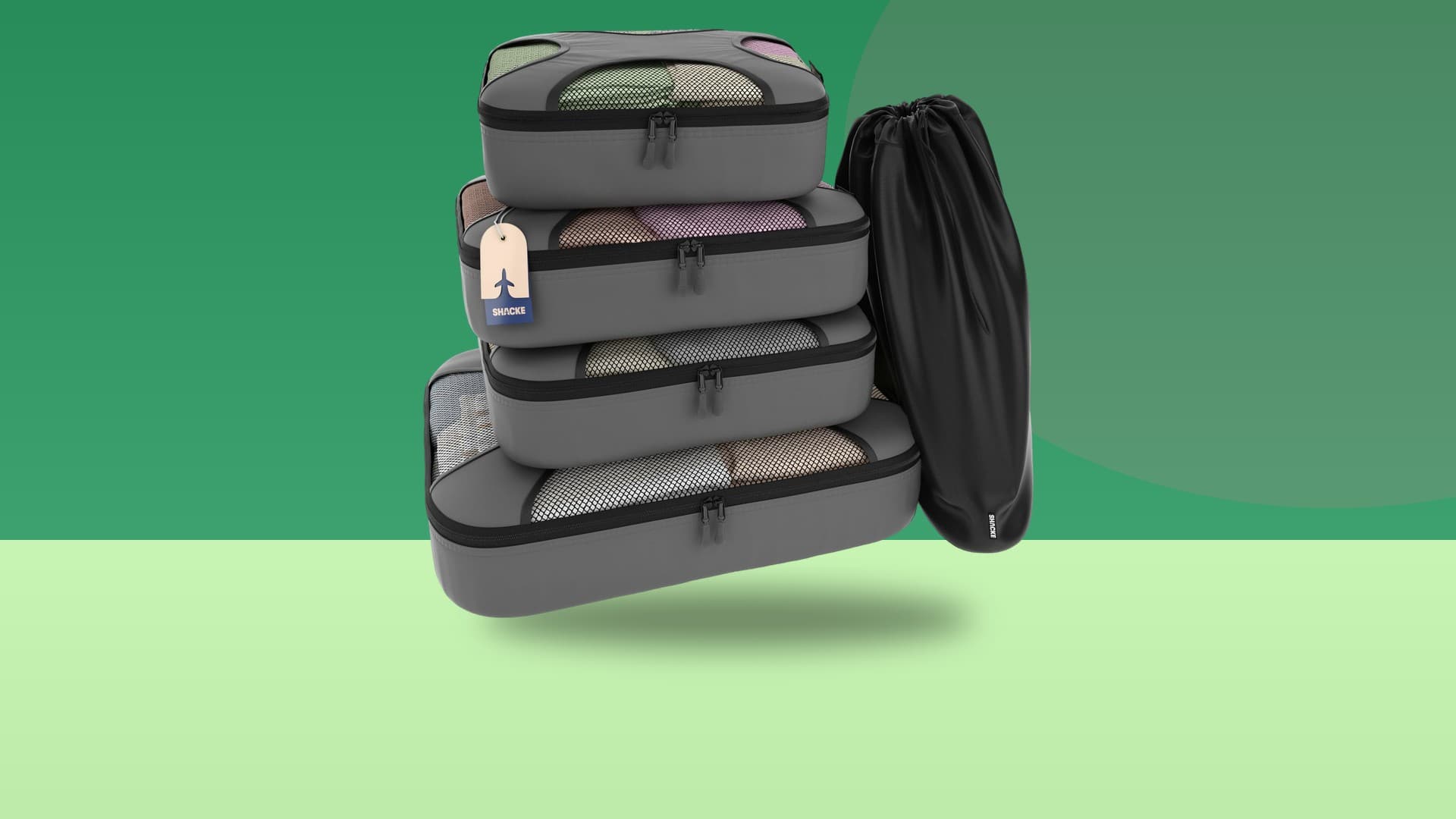 Shacke Pak 5-set packing cubes on a colorful studio background