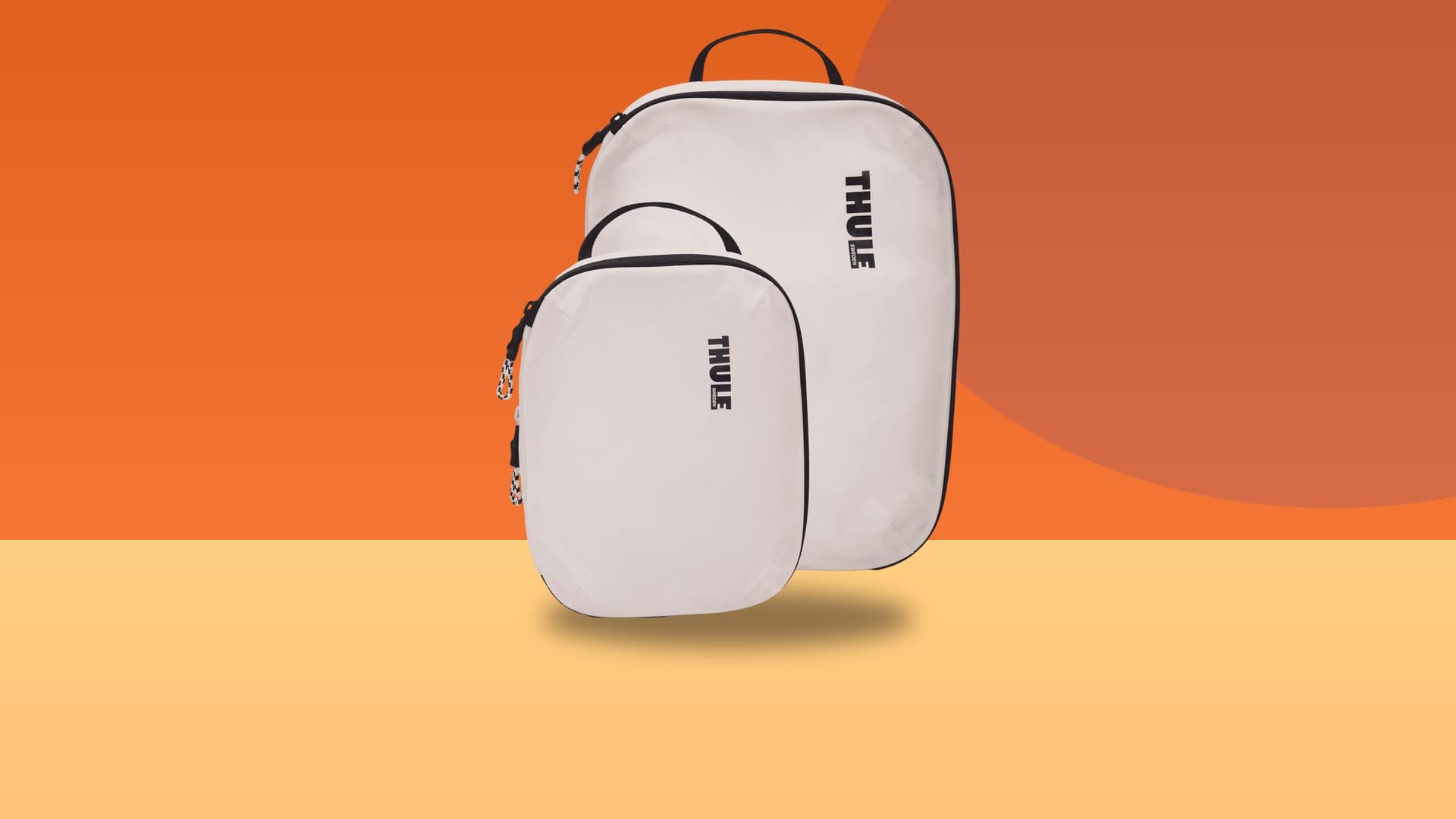 Thule Compression Packing Cube Set cut out on a colorful studio background