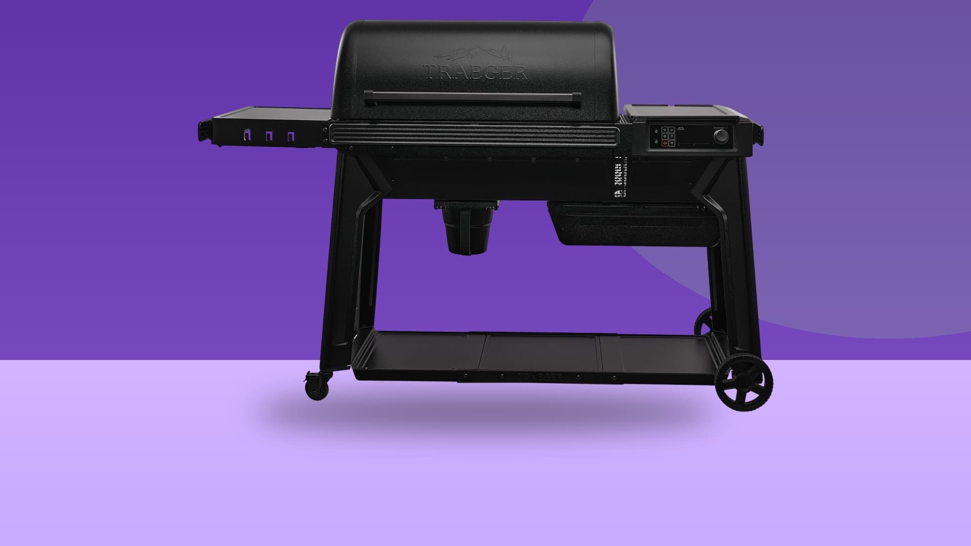 Traeger Woodridge Pro wood pellet grill on a colorful studio background