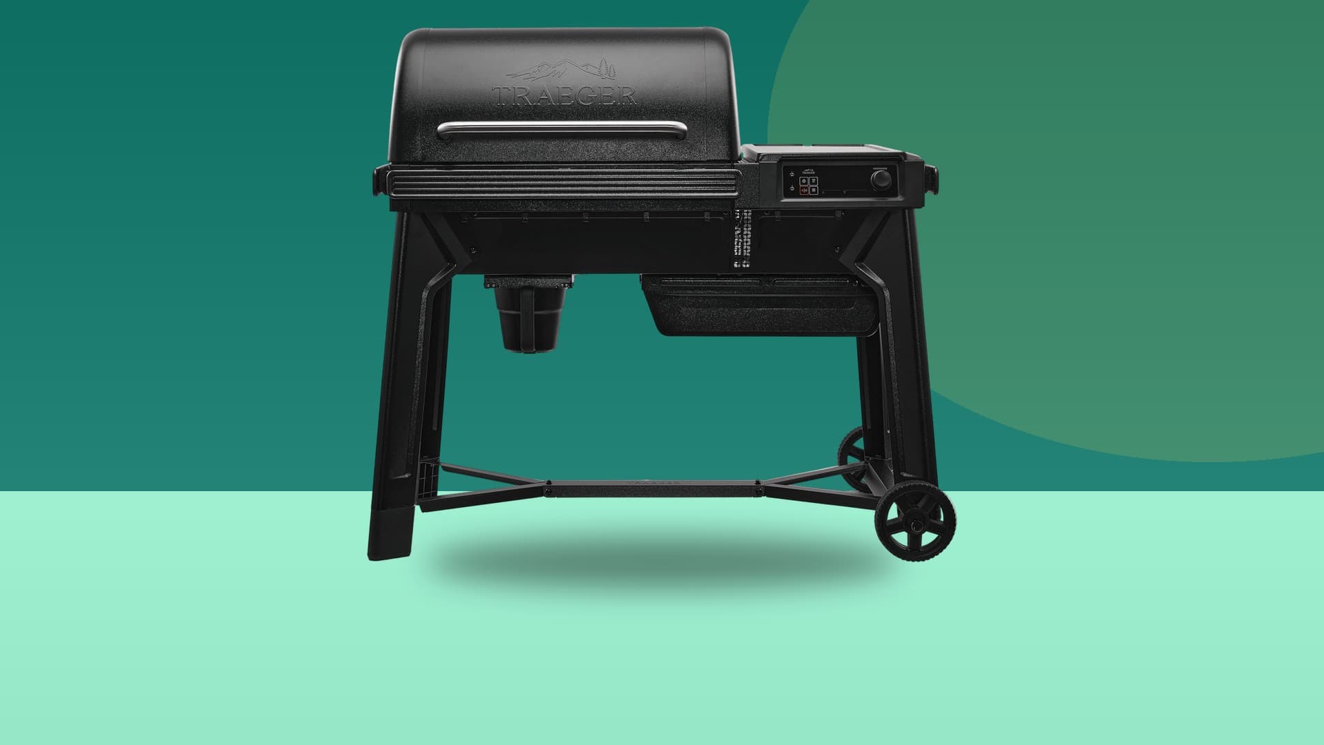 Traeger Woodridge wood pellet grill on a colorful studio background